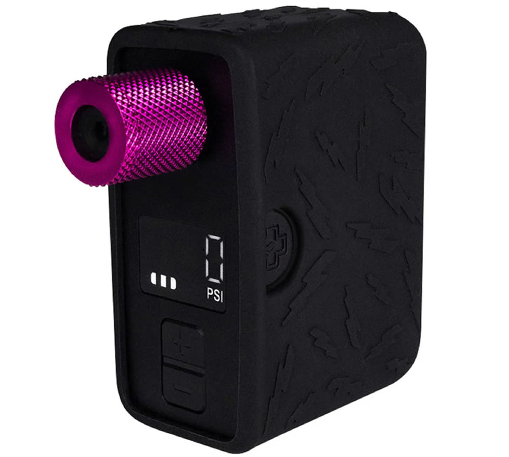 Black air compressor with a purple valve on a white background